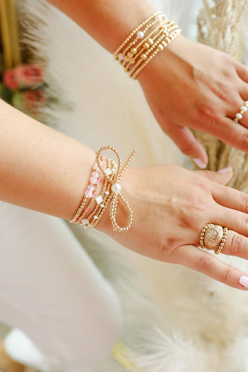 Beaded Blondes gold bow bracelets
