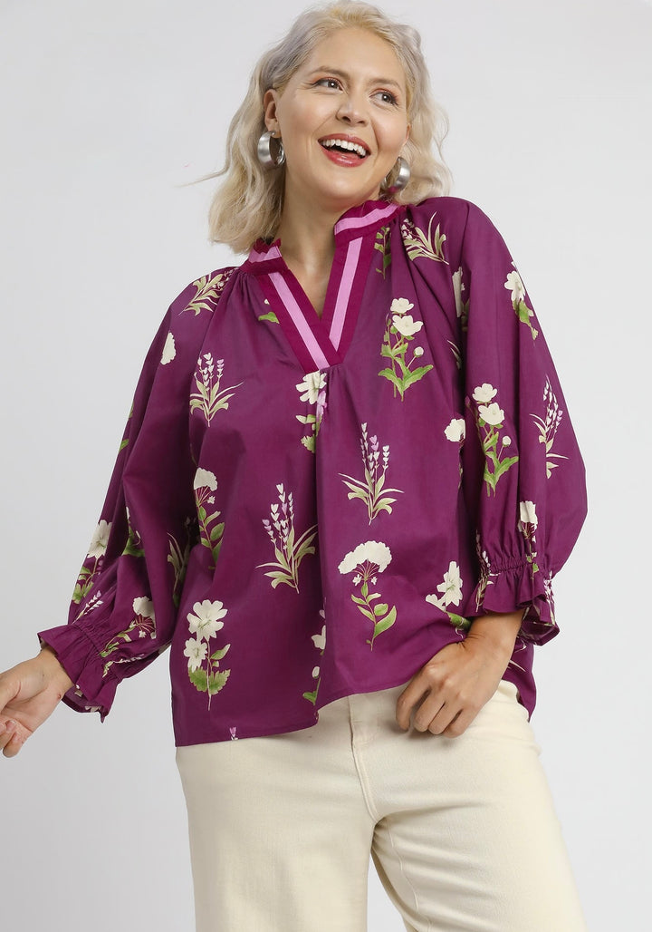 Umgee women's plum floral print poplin top with deep red and pink trimmed v neckline in plus