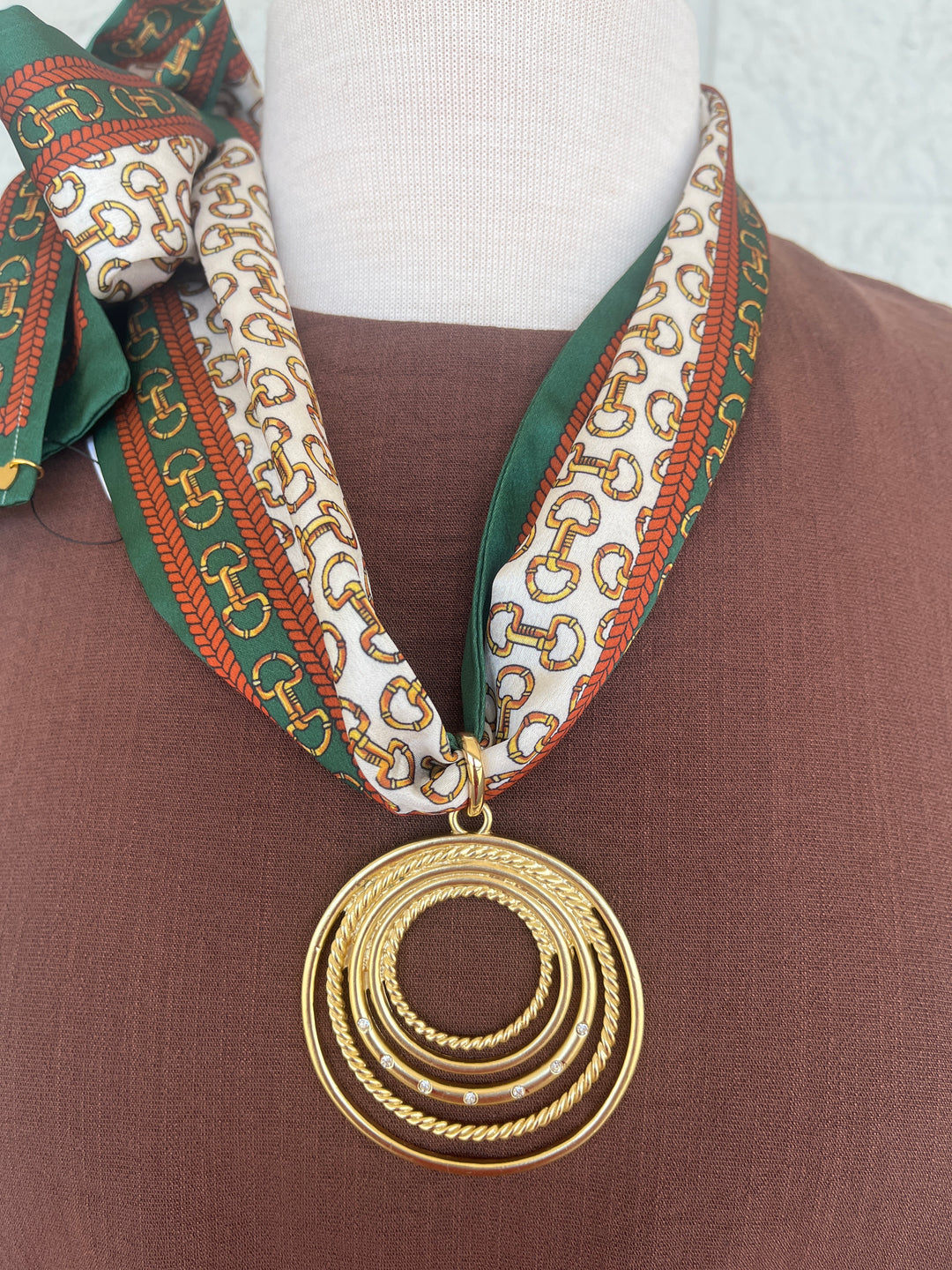 Green and gold chain print scarf necklace with gold and rhinestone round pendant by Hart Designs