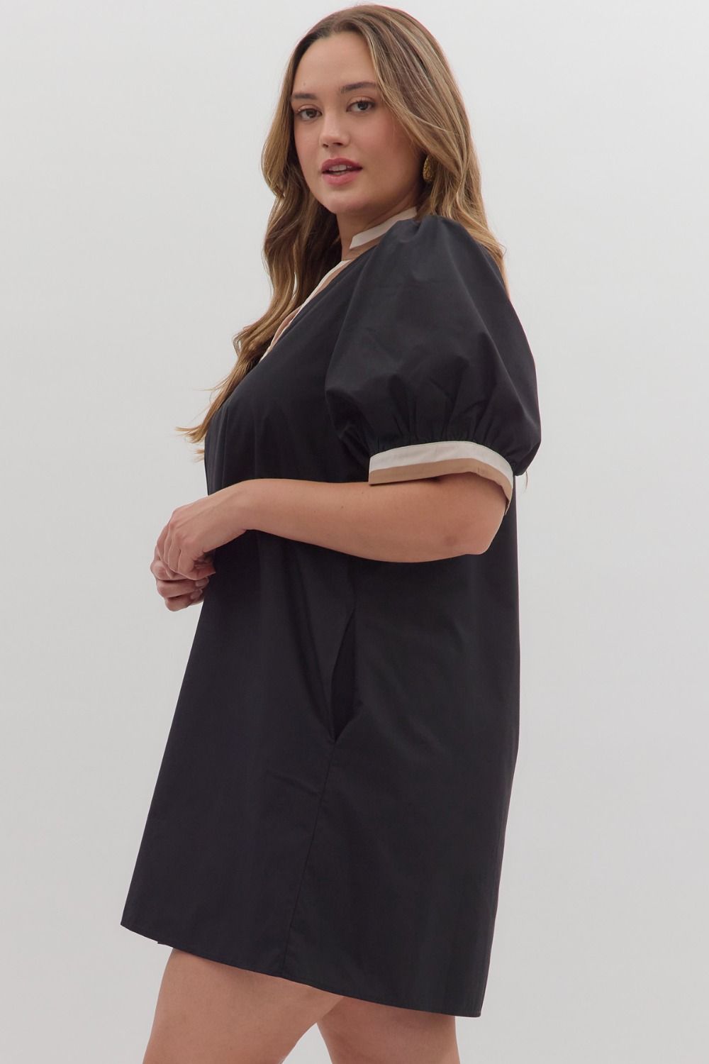 Women's black short dress with cream and tan trim by Entro in plus showing full side view