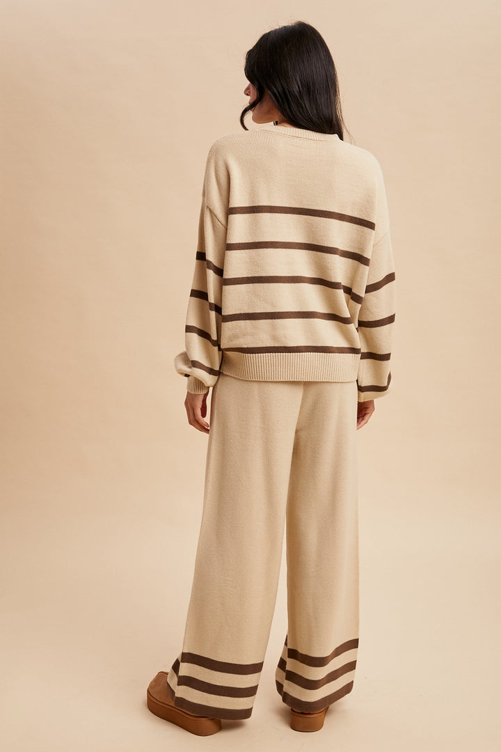 back view of women's beige striped sweater and pants lounge set