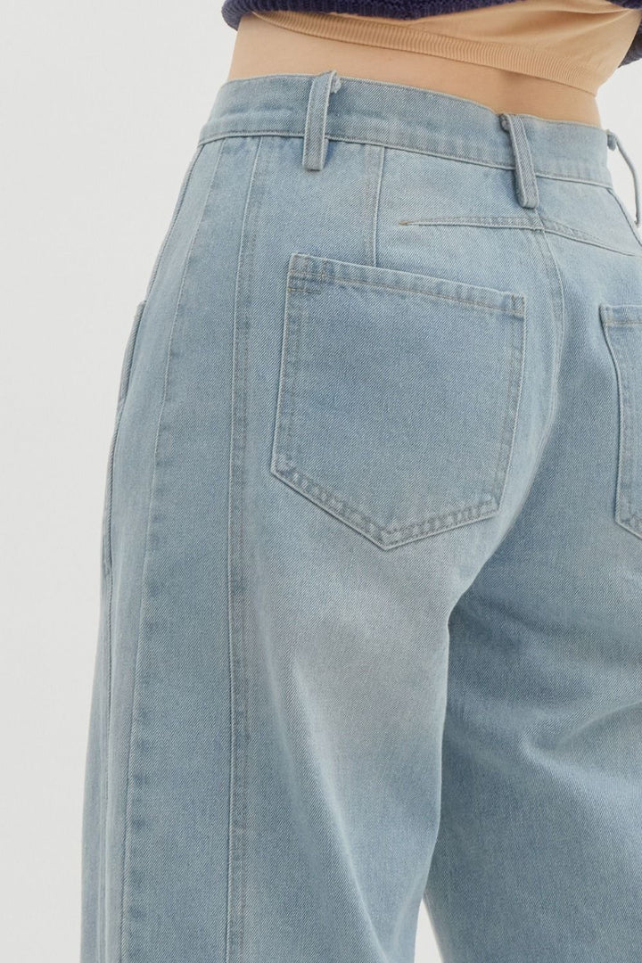 Women's Entro Brand light washed denim barrel jeans showing slight back view