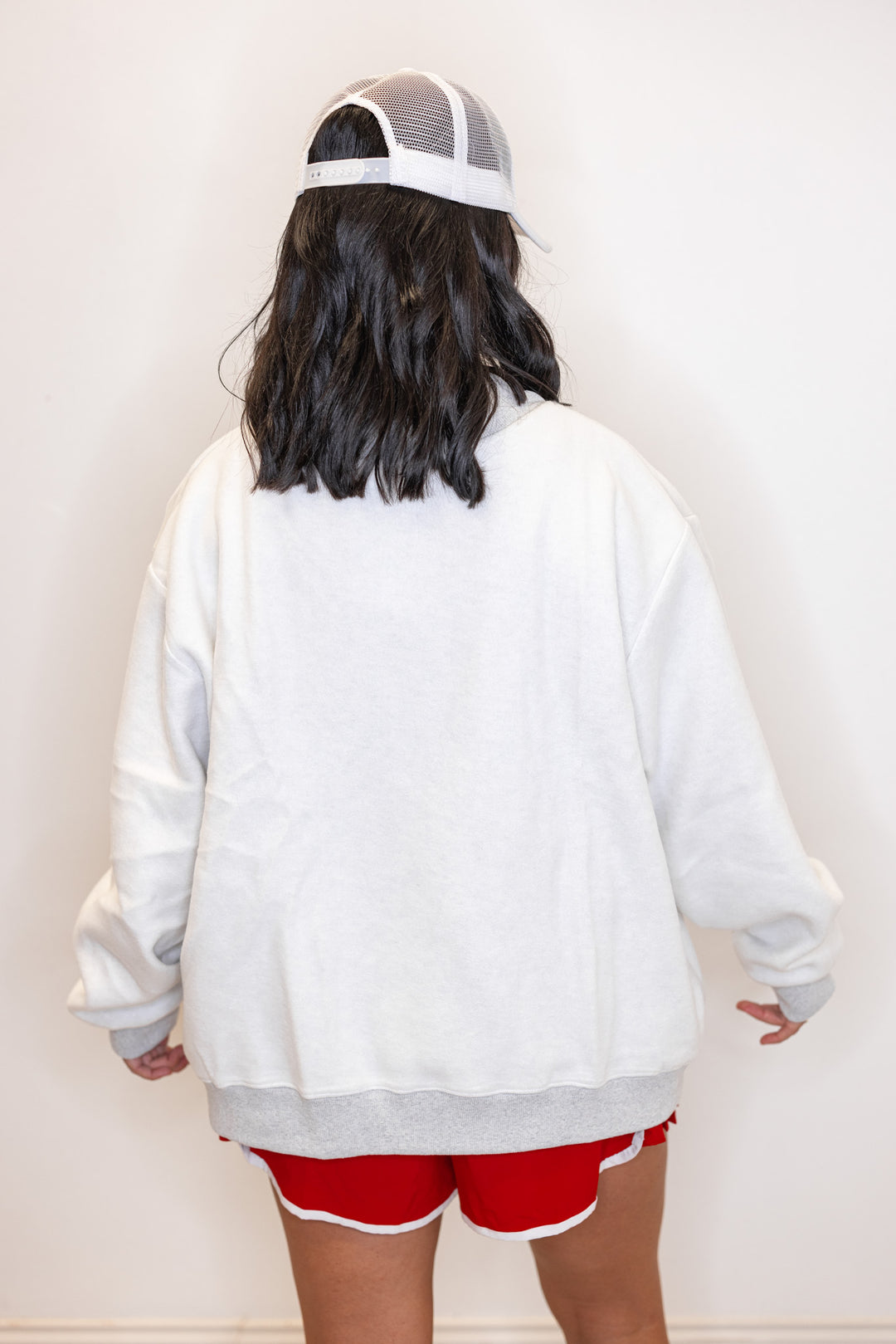 Women's "Georgia/GA" sweatshirt in reversible grey and red or white and red by BucketList showing back view of fleece side
