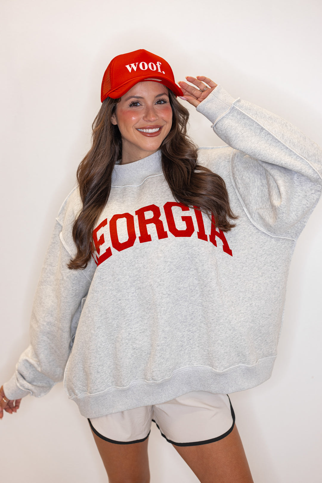 Women's "Georgia/GA" sweatshirt in reversible grey and red or white and red by BucketList showing up close front view of fleece side