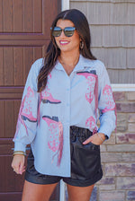 Light blue western button down top with pink fringe detail