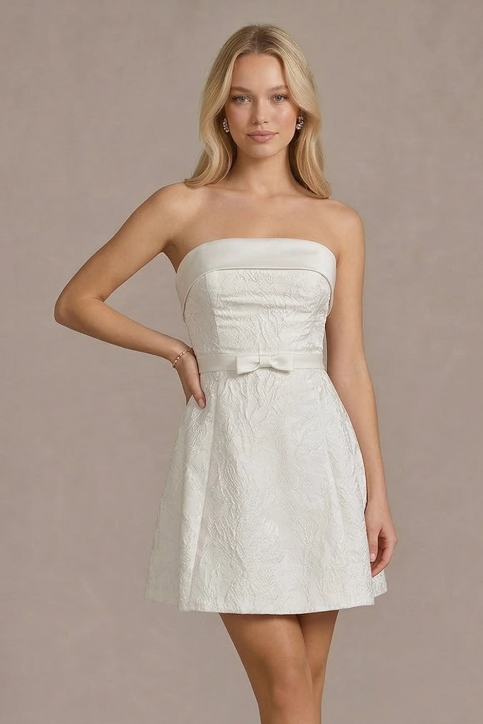 white strapless mini dress with bow detail