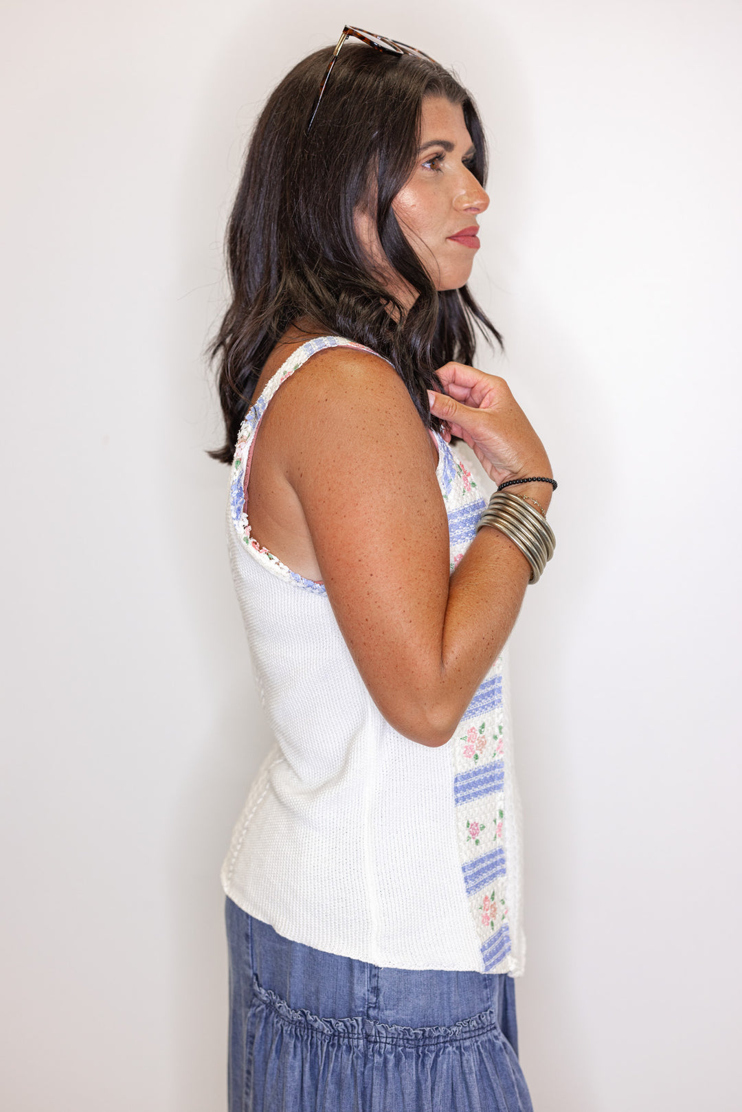 Women's off white sweater knit tank top with pink and blue floral patches by POL showing side view