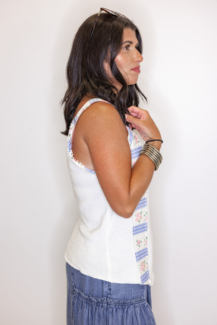 Women's off white sweater knit tank top with pink and blue floral patches by POL showing side view