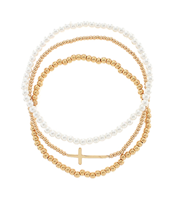 Set of three beaded bracelets with gold and white beads 
