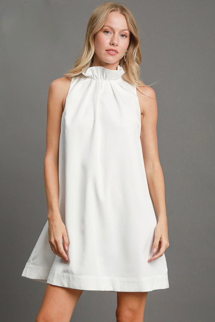 Umgee off white sleeveless dress with ruffled mock neck
