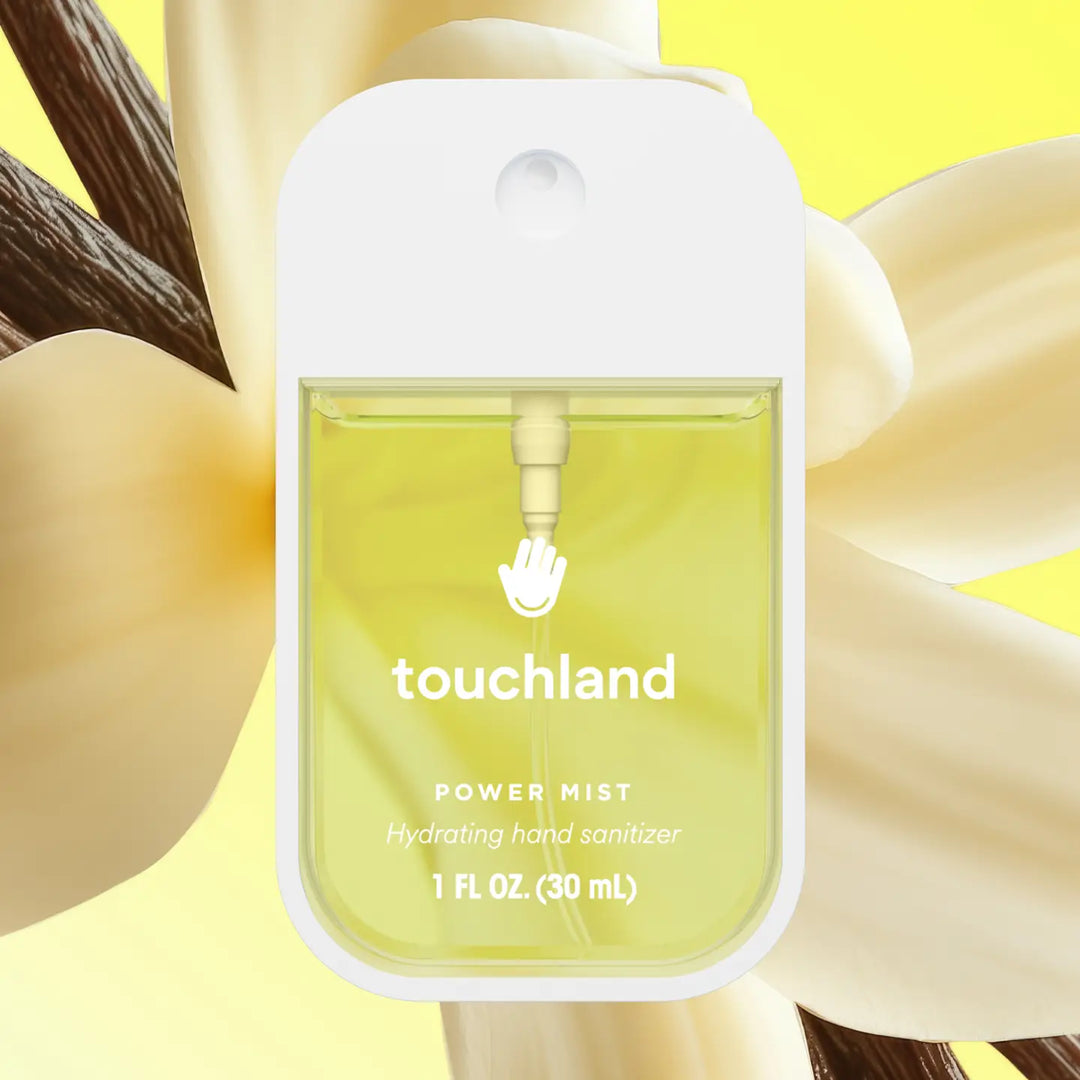 Touchland power mist hydrating hand sanitizer with a floral background