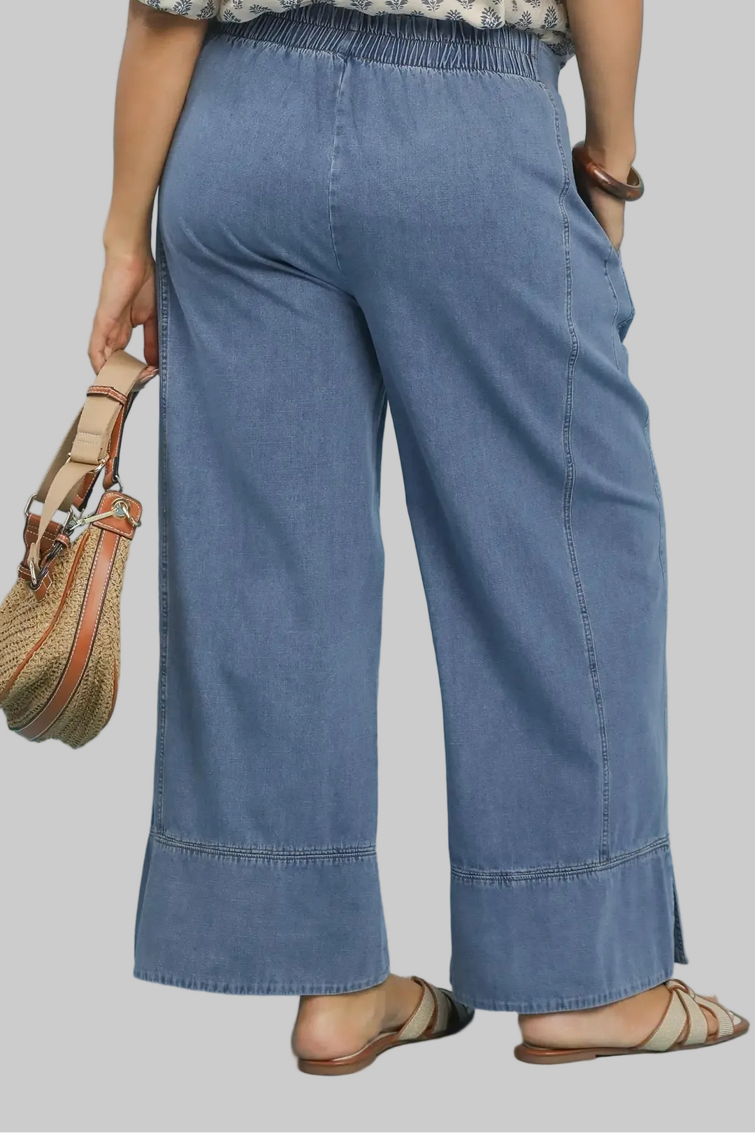 Umgee light washed blue denim wide leg pants in plus size with a flattering silhouette