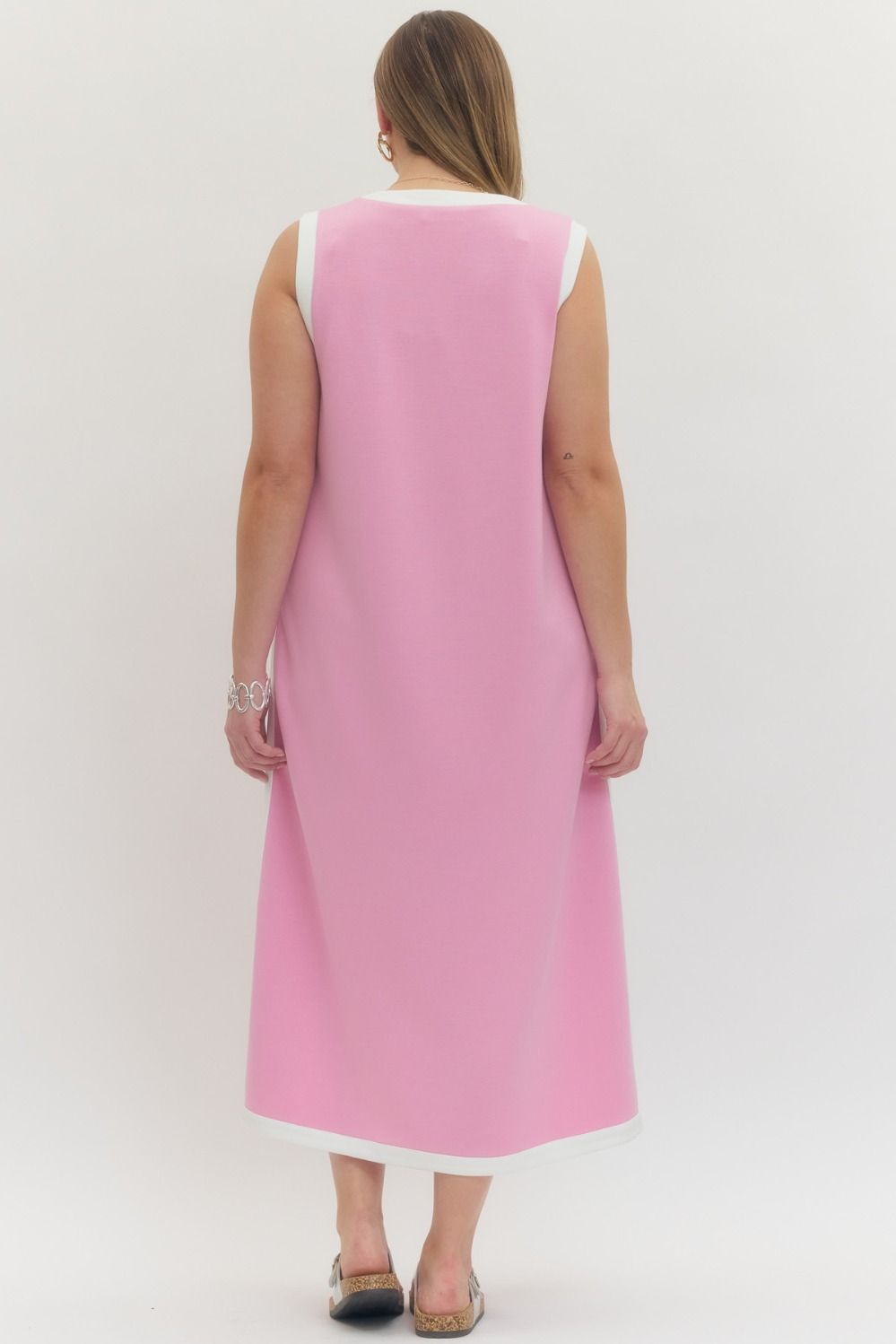 Back view of Women's plus size pink and white trimmed  casual midi dress