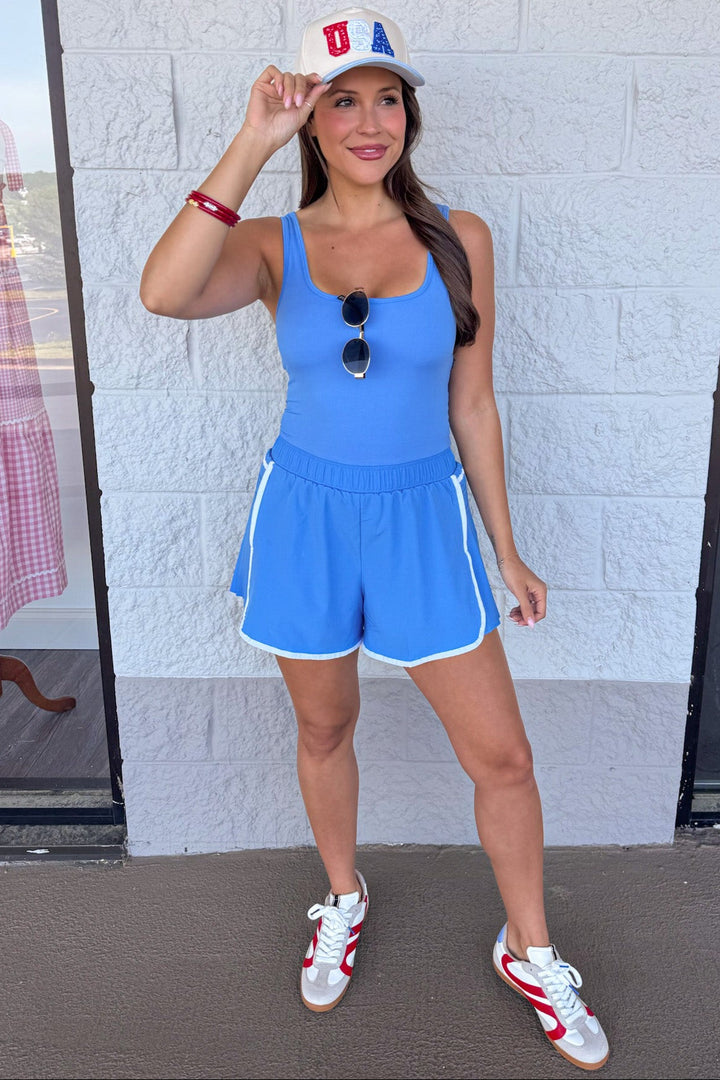 aqua blue with white trim details square neckline activewear romper