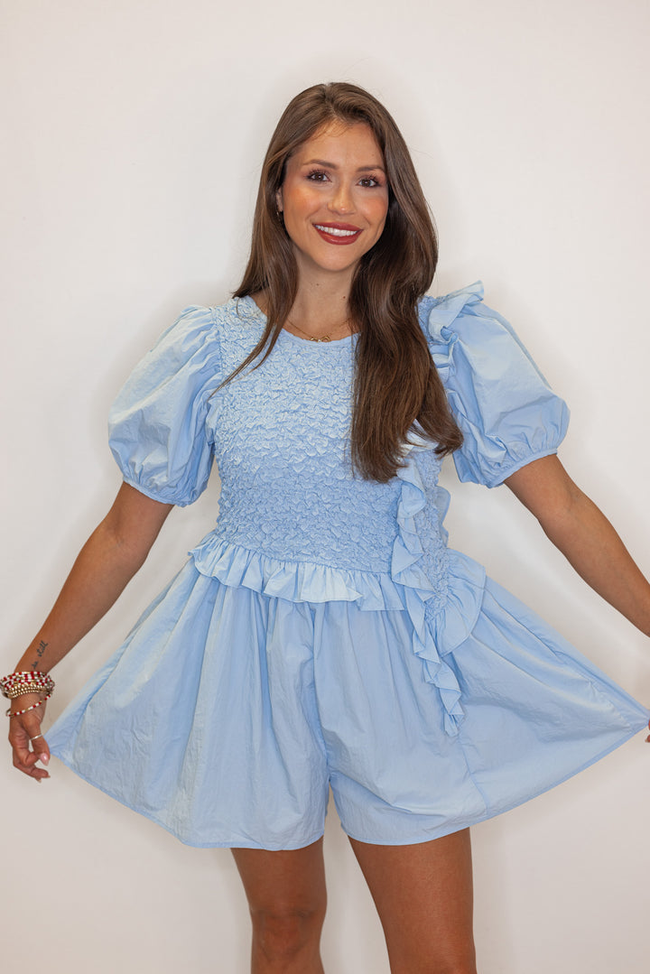 baby blue smocked chest flowy leg romper