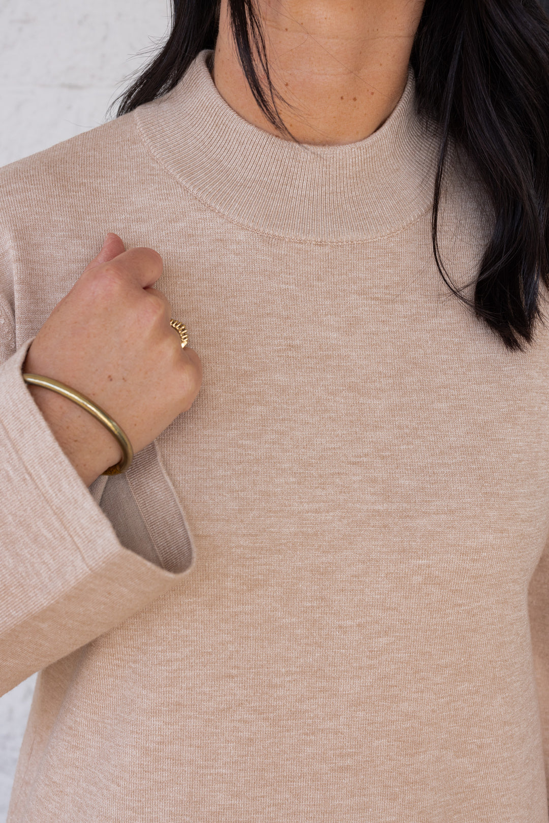 Women's sand beige knit long sleeve midi sweater dress by Entro showing ribbed neckline