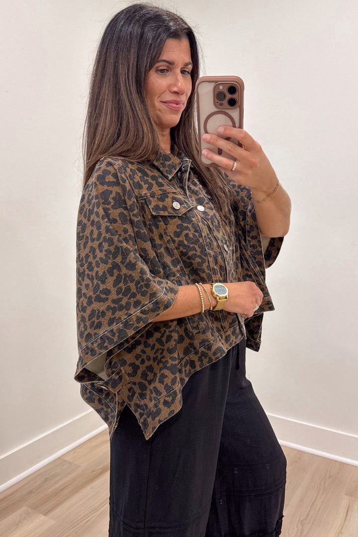 brown and black leopard print snap button front denim poncho style jacket top with short drape sleeves