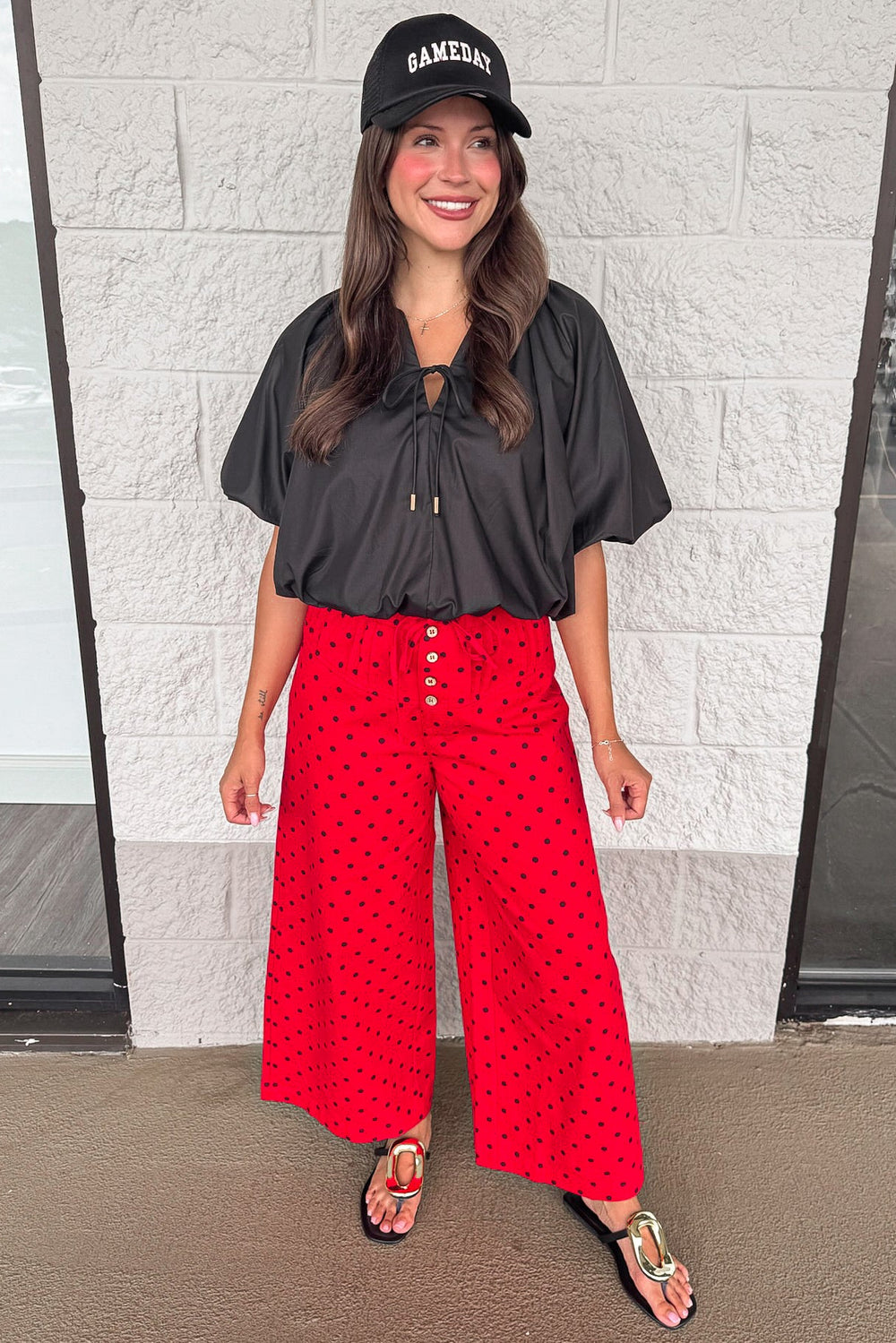 solid black bubble hem short puff sleeve v neckline semi-cropped top