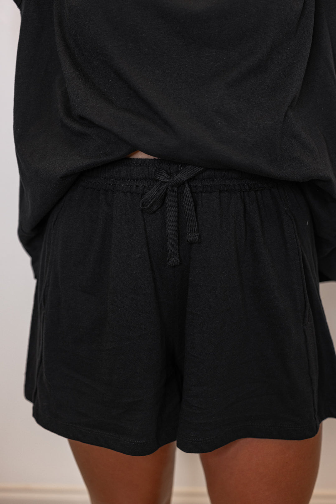 Black cotton slub knit shorts and top set by Rae Mode showing up close front view of shorts