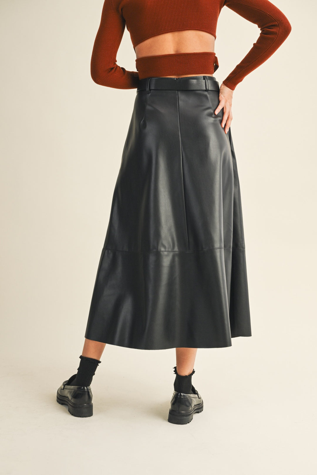 Women's black faux leather flowy midi skirt with belt by Mustard Seed showing back view