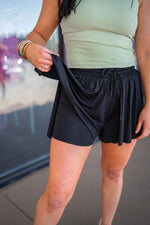 black flowy stretchy athletic shorts