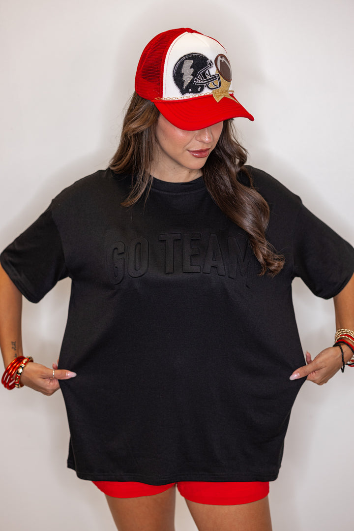 Women's black lightweight top with embossed 'Go Team' in center by Jess Lea showing relaxed fit