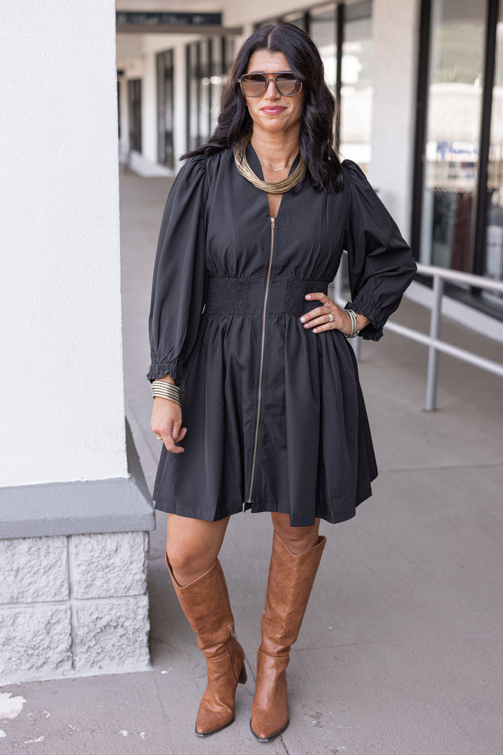 Women's black dress with zipper front closure by Umgee showing full front view