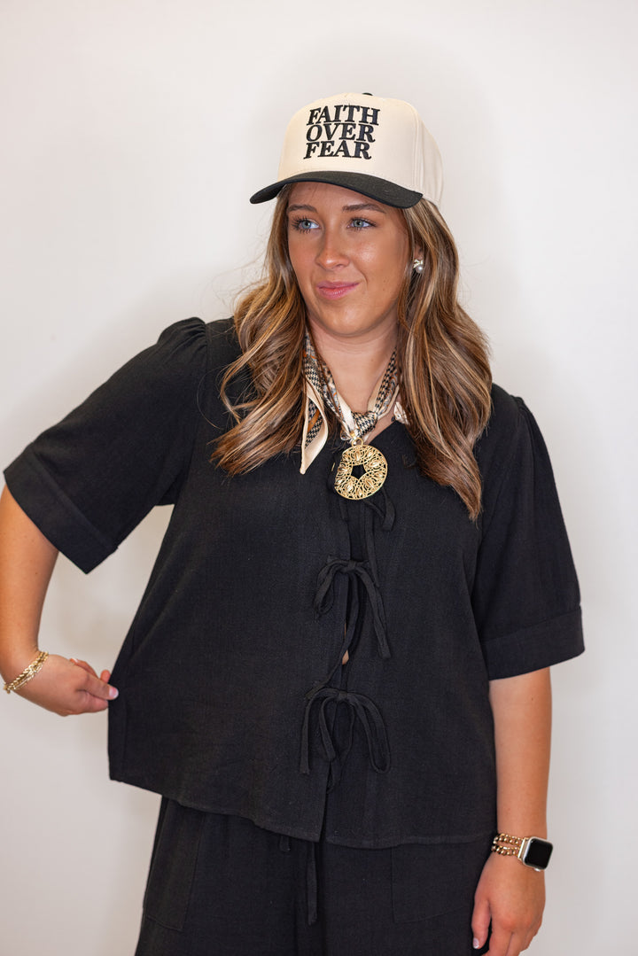 Women's black linen bow tie top and elastic waist wide leg pants set by Jodifl   showing tops relaxed silouhette