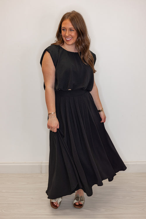 dressy black bubble hem top