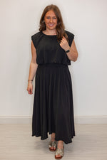 dressy black bubble hem top