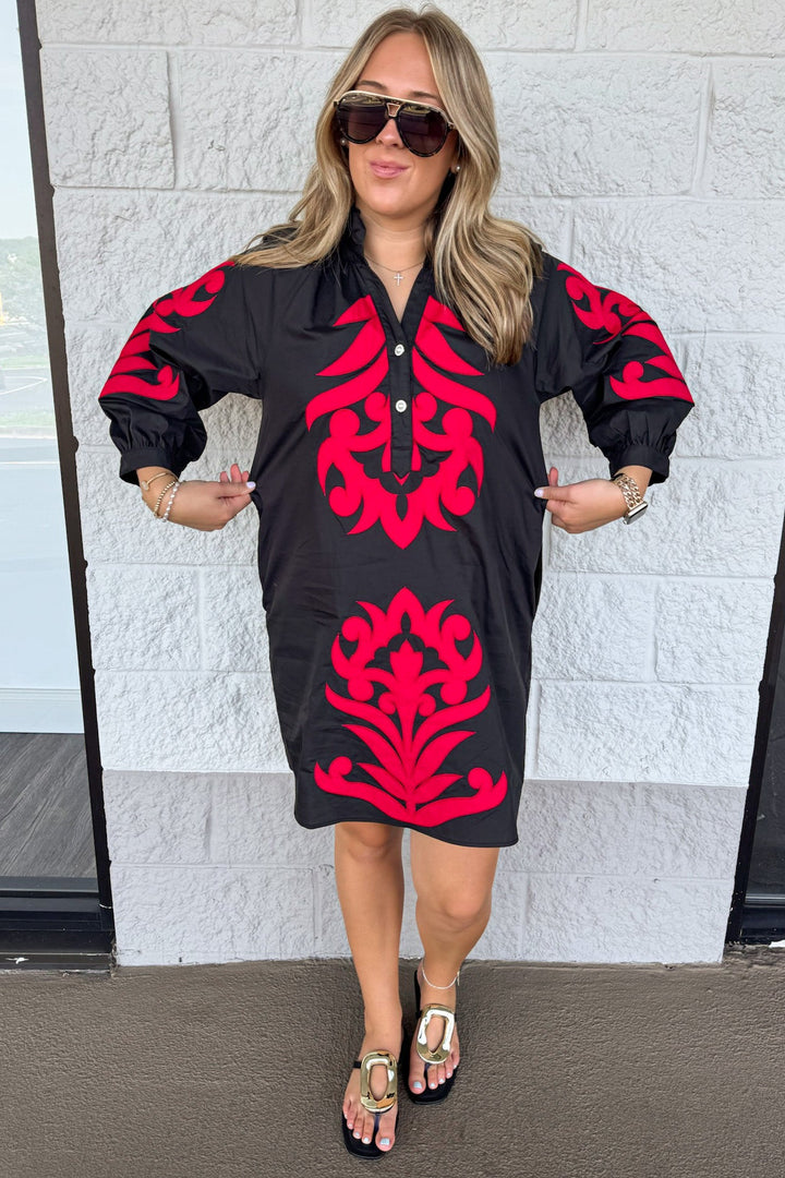 black with large red floral print half length balloon sleeve relaxed silhouette short dress