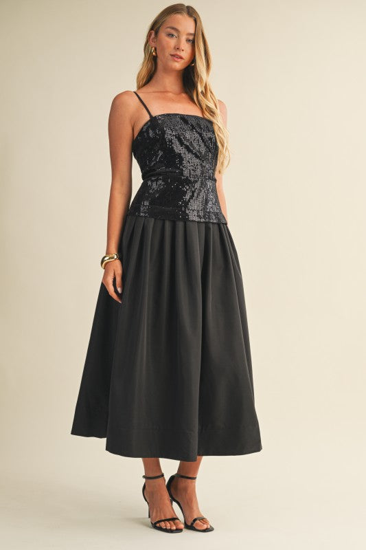 Women's black midi dress with sequin bodice and detachable spaghetti straps by Mustard Seed showing side view