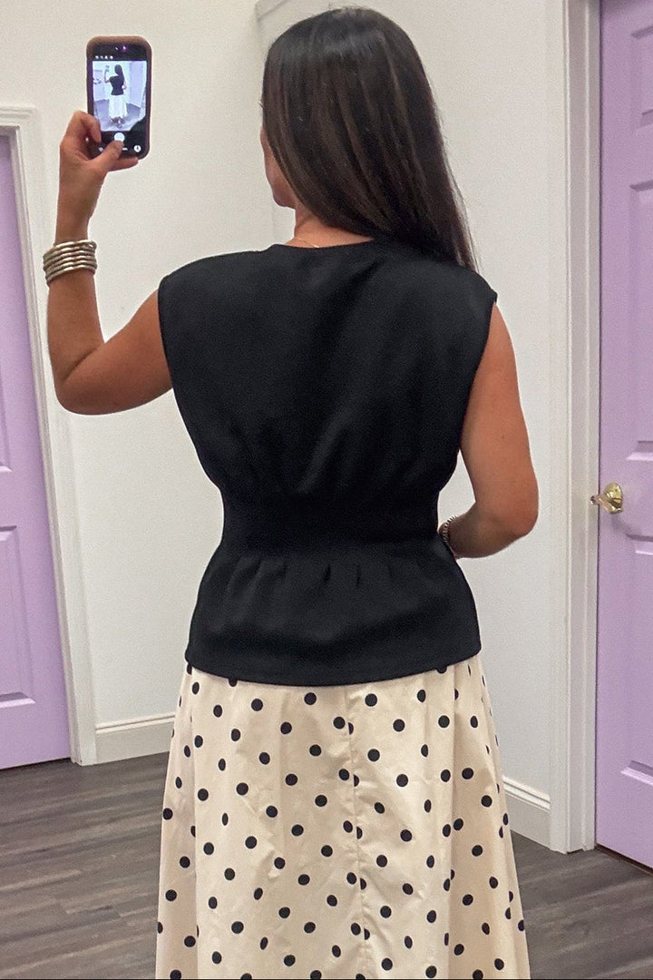 classy solid black crew neckline sleeveless luxe knit peplum top
