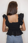 black smocked peplum bow top