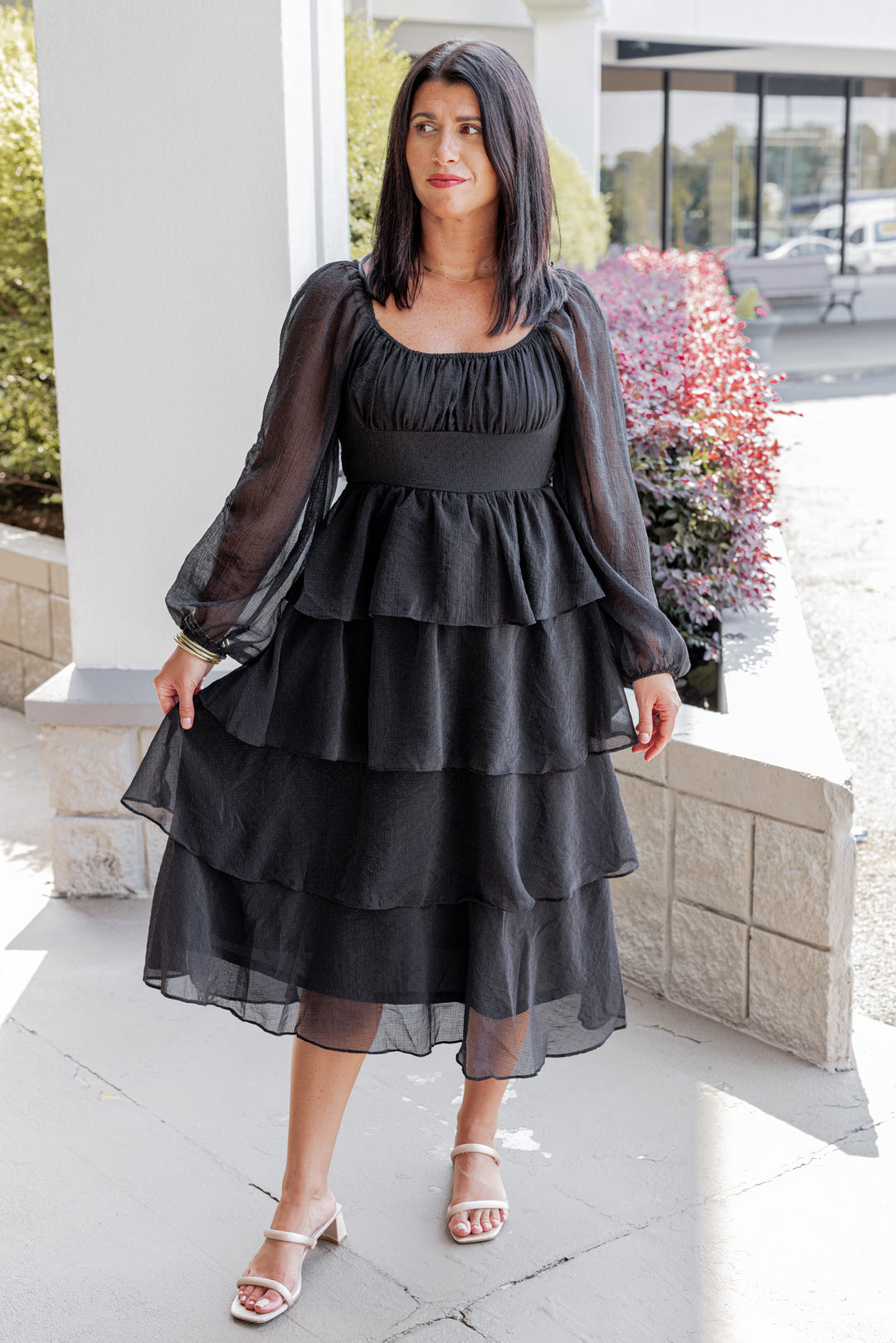 Women's black ruffle layer tiered midi dress with black shimmering details Blu Pepper showing full front view