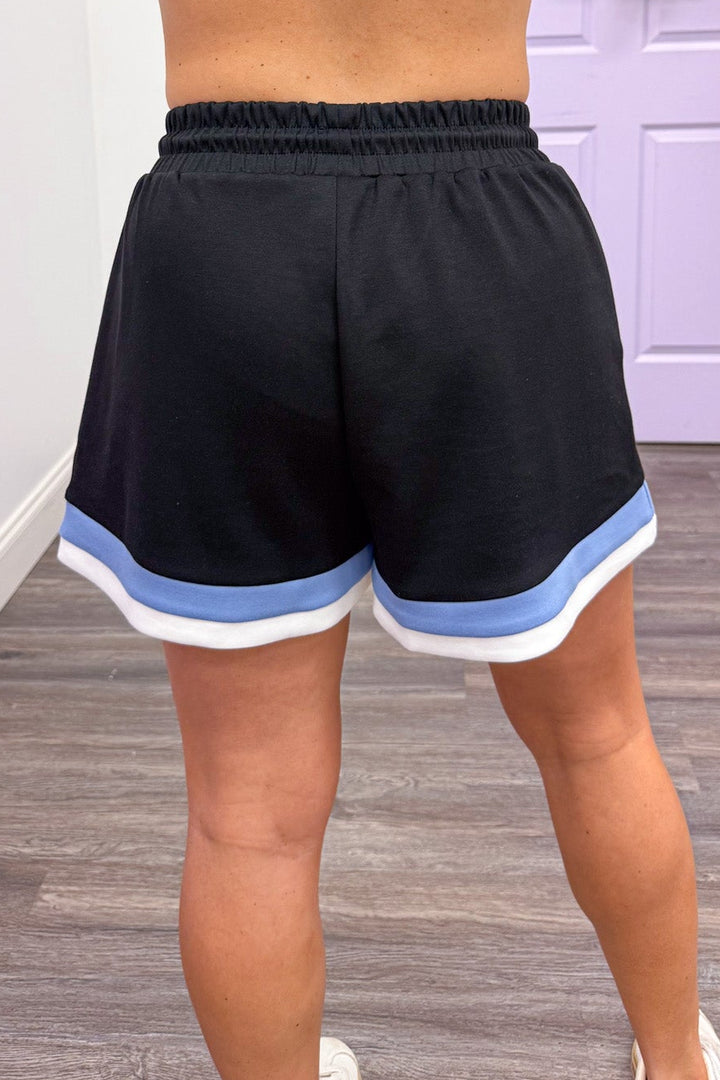 blue and white trimmed scuba knit black shorts relaxed silhouette