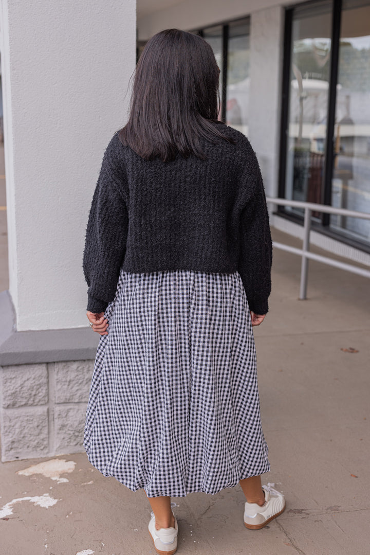 Women's black and white gingham textured midi skirt with bubble hem by Easel showing full back view