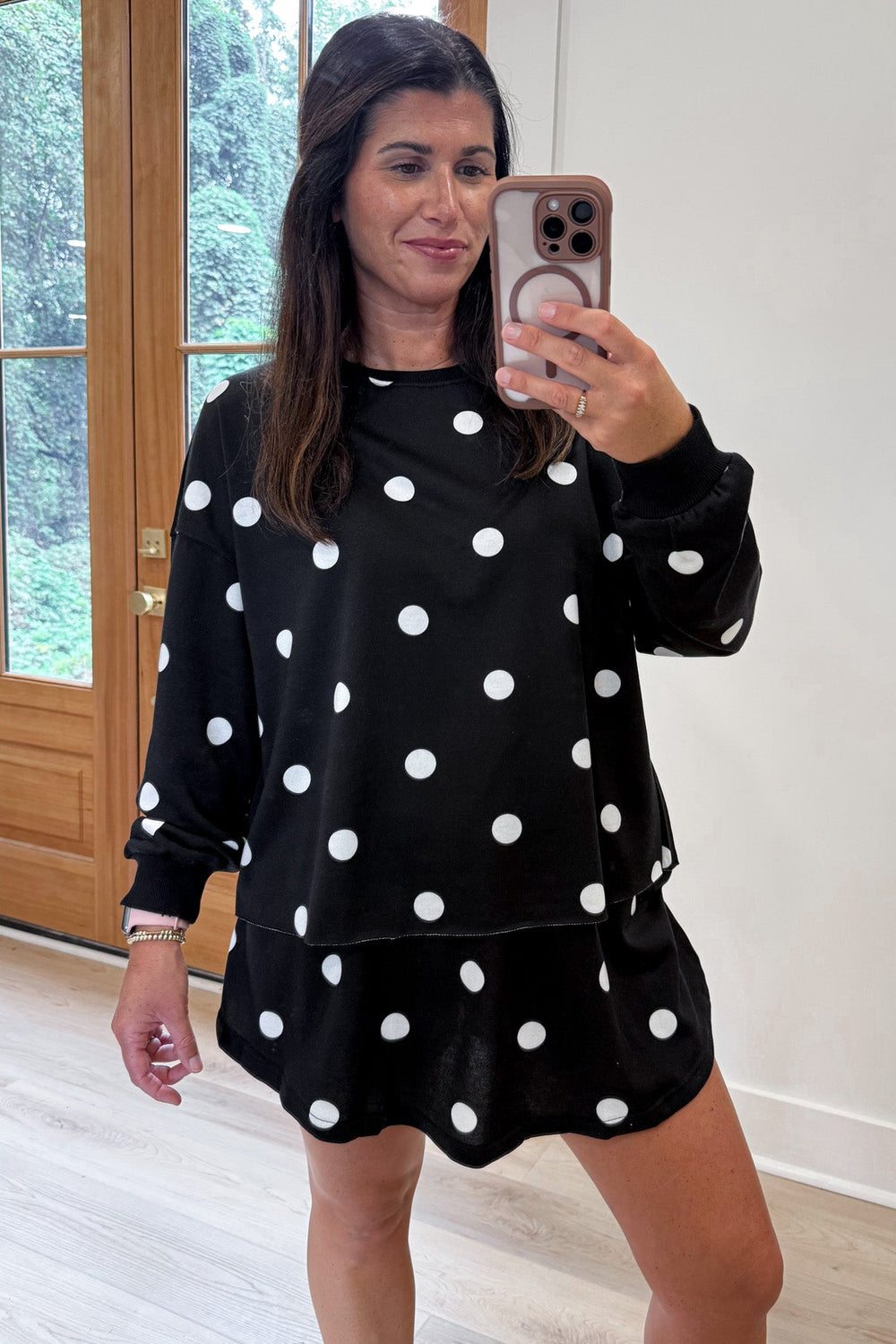 black with white polka dot print long sleeve top and skort matching terry cotton knit set