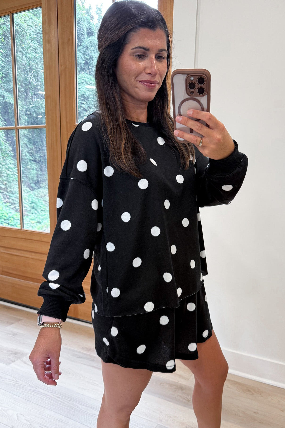 black with white polka dot print crew neckline top and skort matching terry cotton knit set