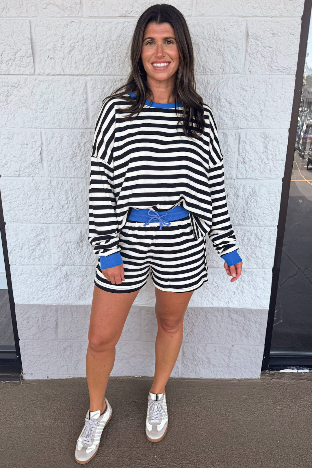 black and white striped with blue trim pullover and wide leg shorts matching knit set