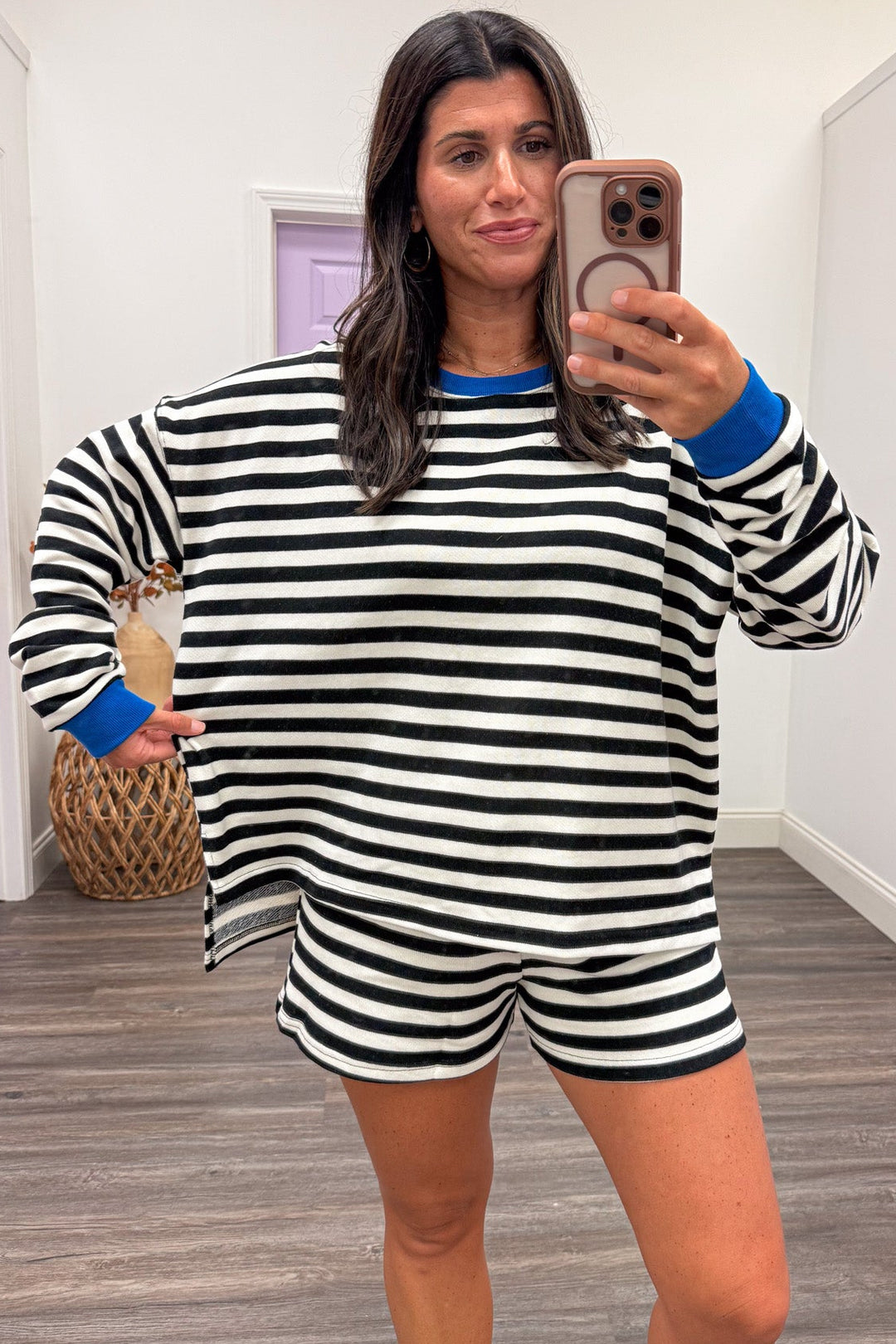 black and white striped with blue trim relaxed silhouette pullover and shorts matching knit set