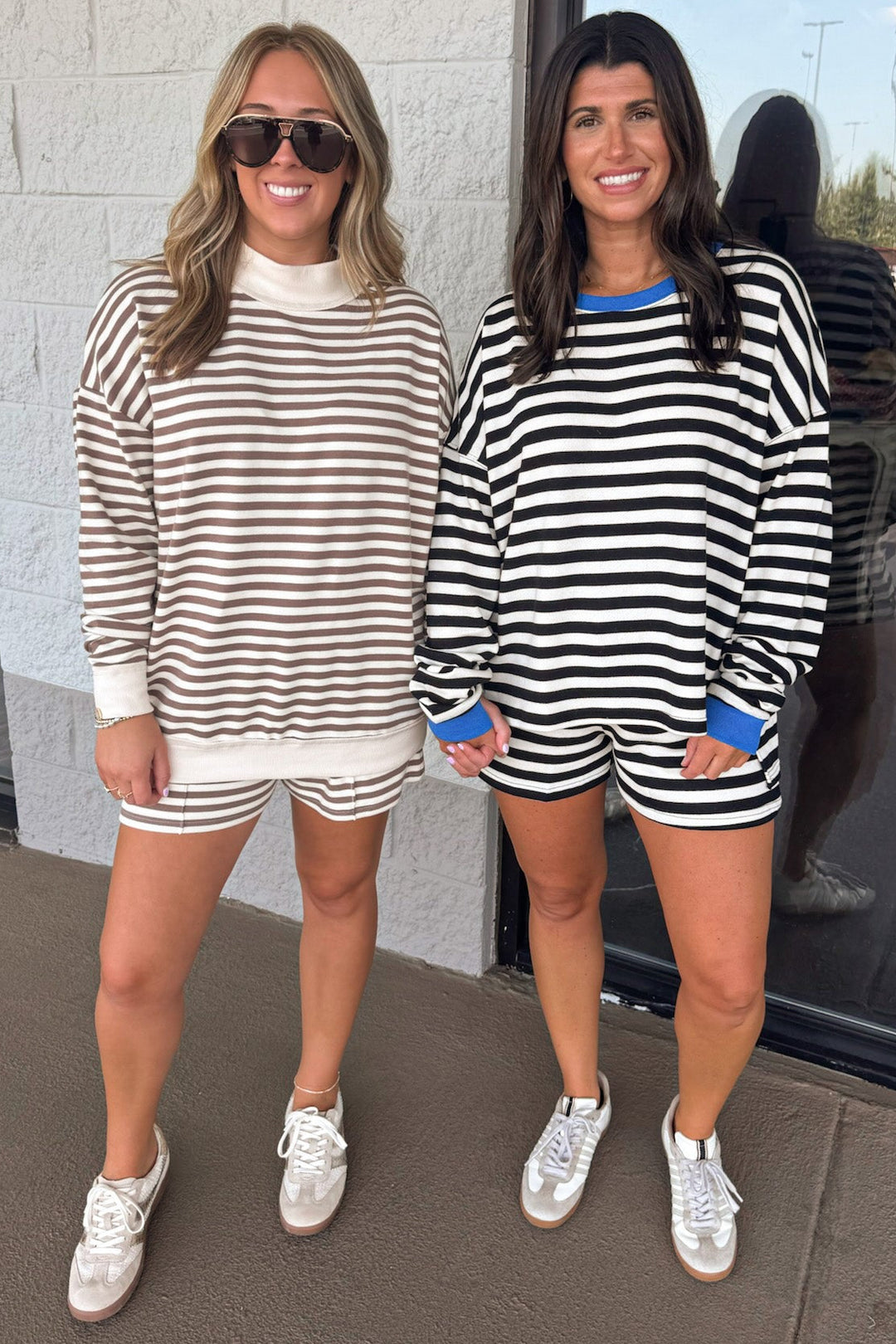 black and white striped with blue trim pullover and shorts matching knit set