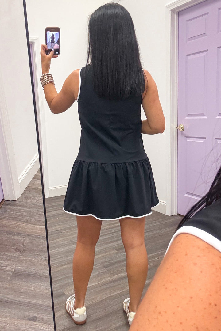 white trim detail sleeveless quarter zip black short active tennis dress