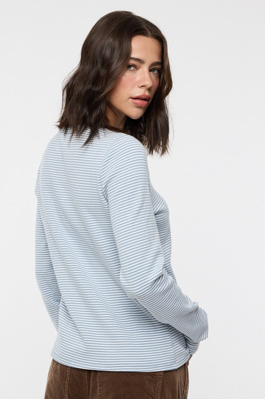 Women's blue and white striped knit long sleeve top by Wishlist showing back view