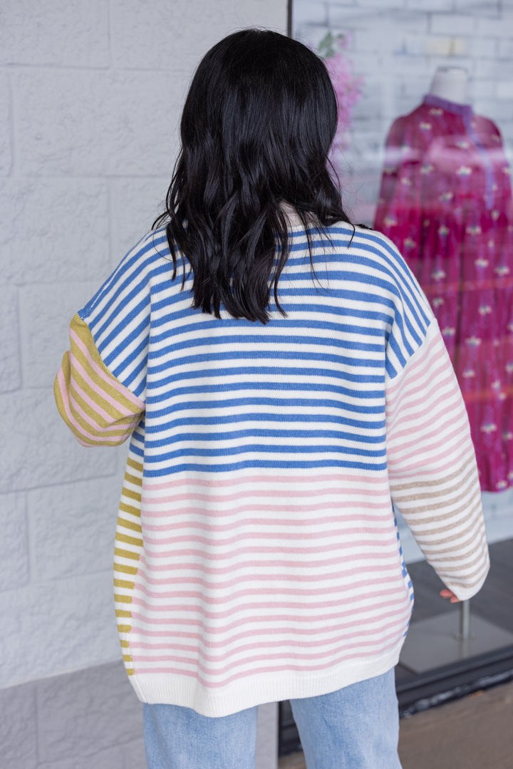 Women's blue, taupe, pink, olive and cream striped colorblock open front knit cardigan by Hyfve showing up close back view