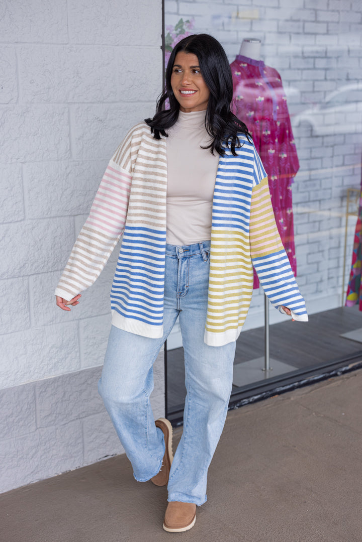 Women's blue, taupe, pink, olive and cream striped colorblock open front knit cardigan by Hyfve showing full front view