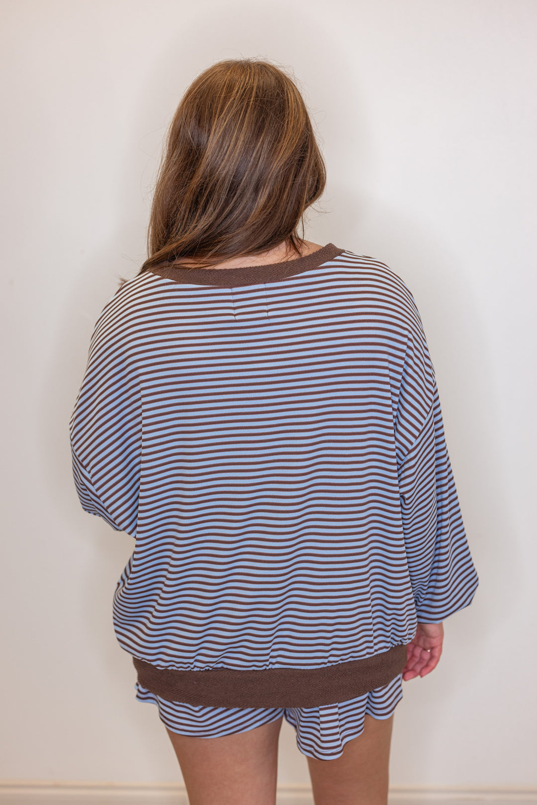 Womens light blue and brown striped knit top with contrasting terry knit trim by BucketList showing back view
