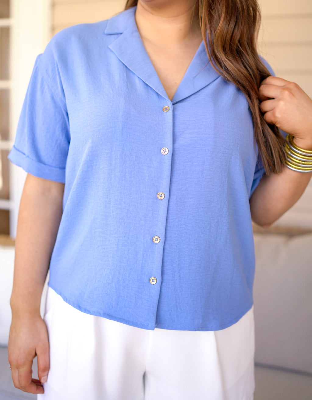 classic style blue button down top