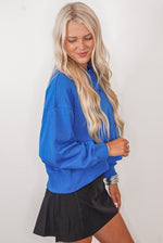blue semi cropped collared knit pullover