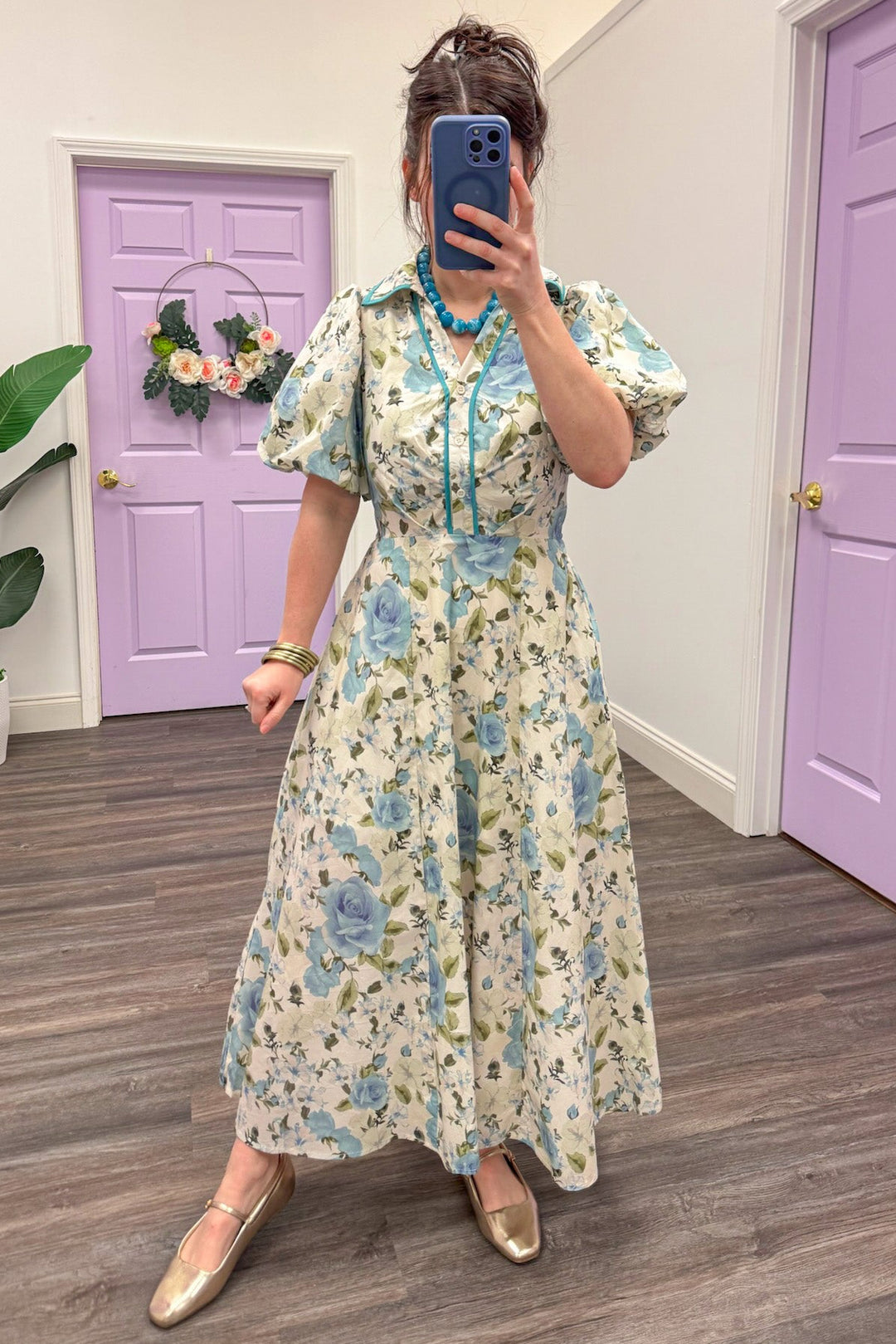blue and cream floral print puff sleeve v neck midi dress